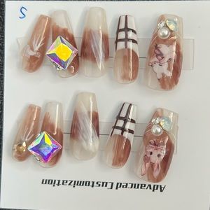 Hand made press on nails set only.